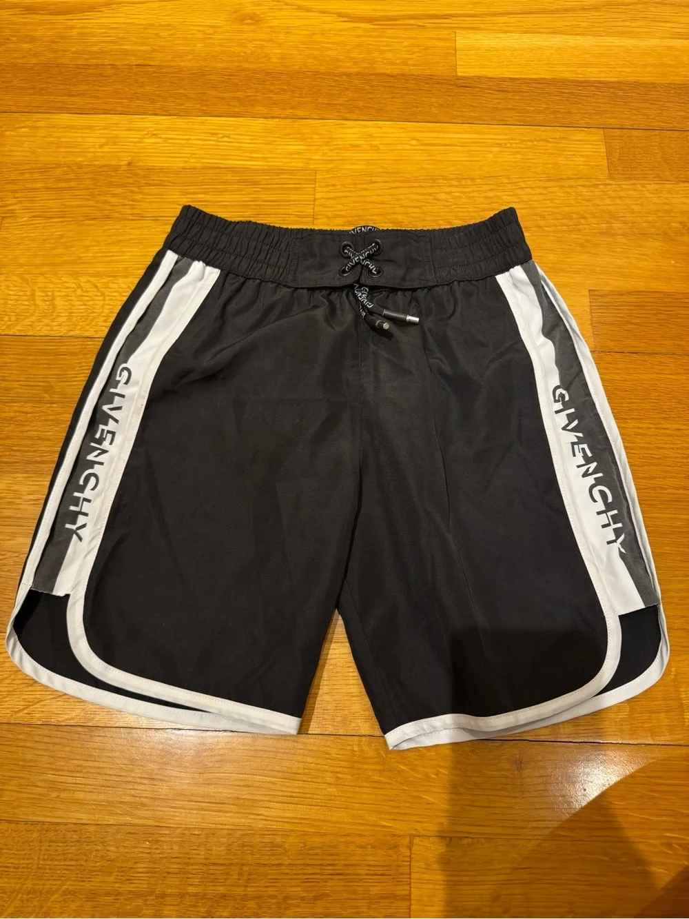 4 pairs of swim shorts Kids Graphic and Solid swim Shorts Pack - size 12